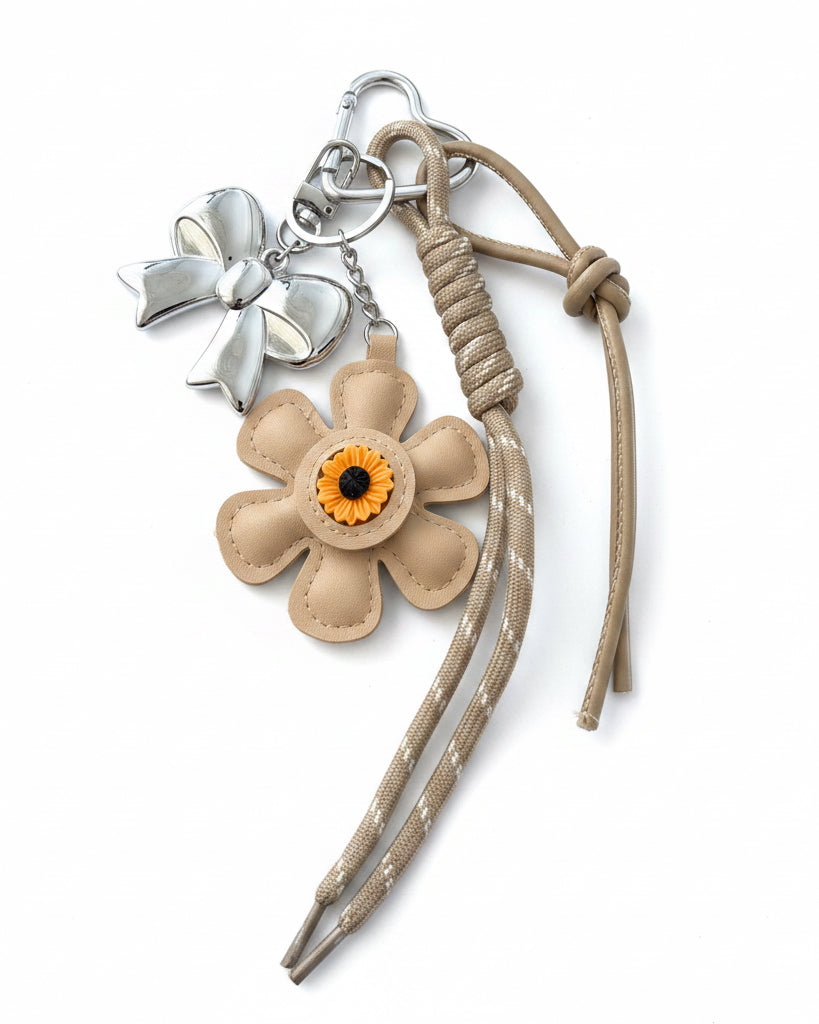 Porte clé fleur beige