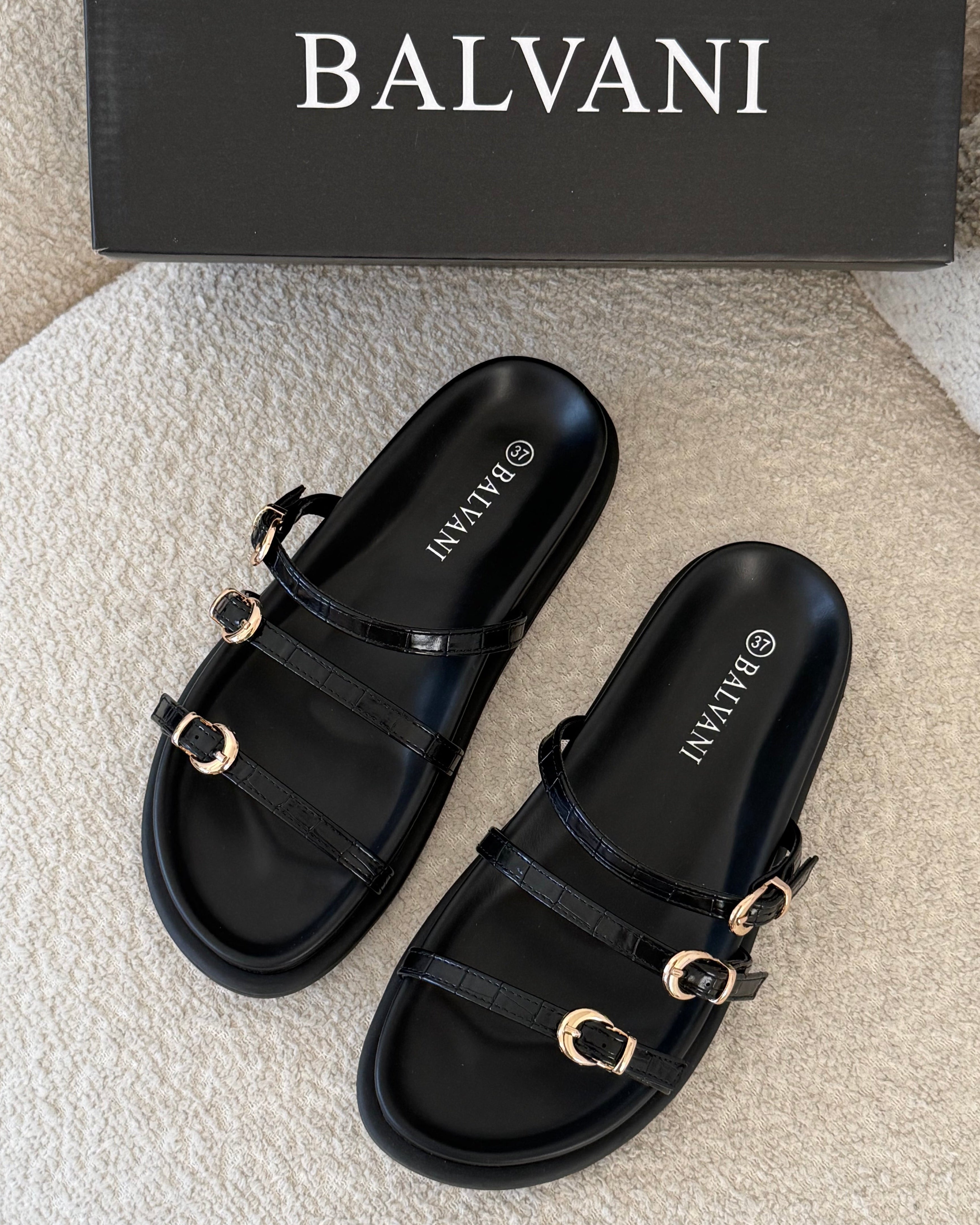 mules croco Noir