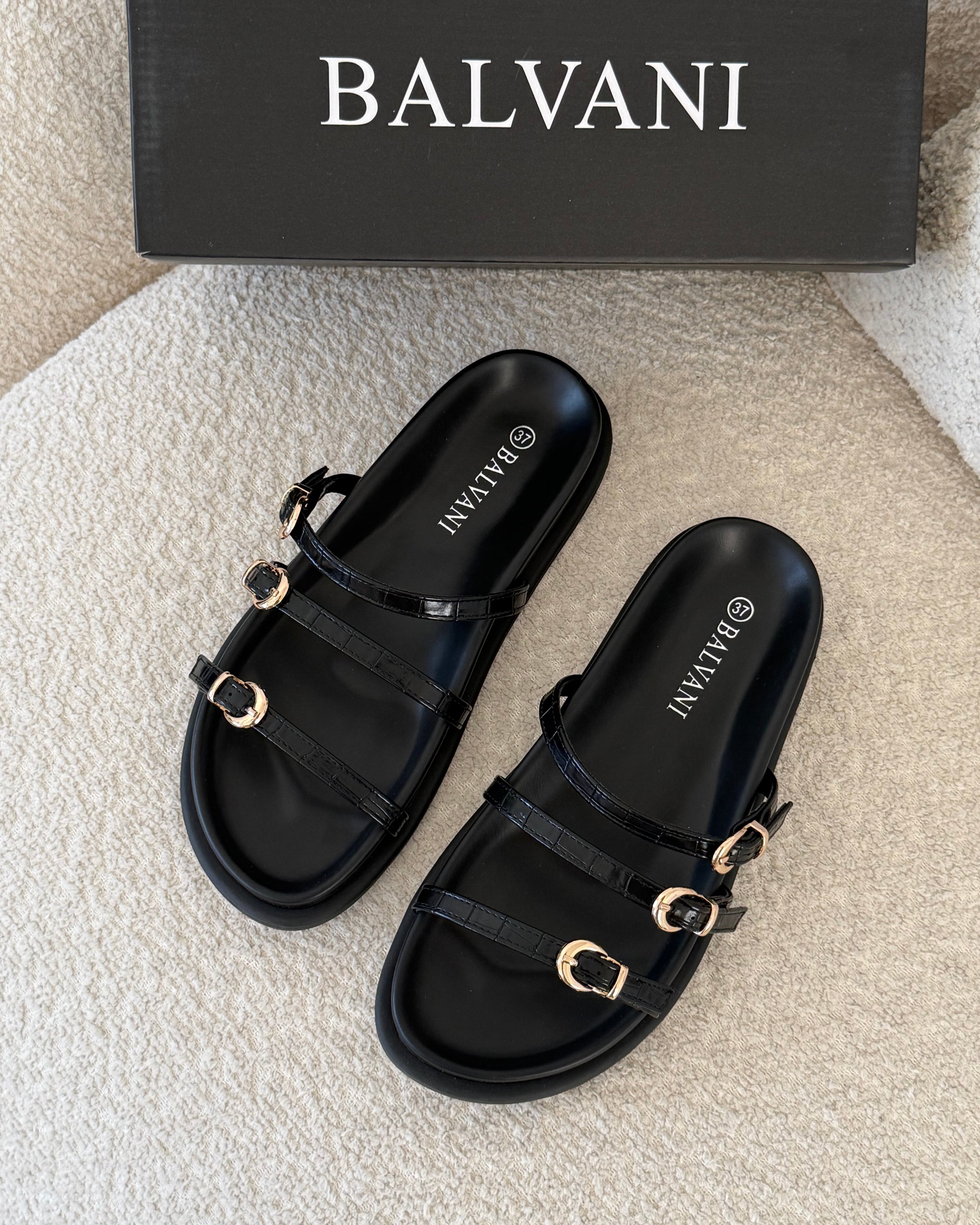 mules croco Noir
